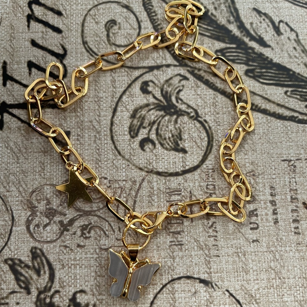 Taupe crystal butterfly & star charm paperclip gold tone necklace - Picture 4 of 8